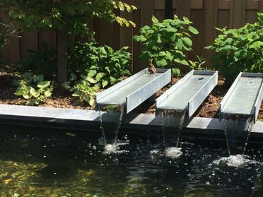  Vijver met waterornament
